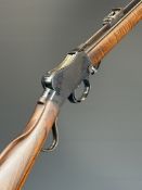 BSA .22 underlever-action rifle with named action, adjustable pop-up ladder sights, sling mounts and