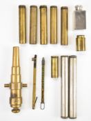 A collection of antique gun accessories comprising ten oil bottles and two percussion cap