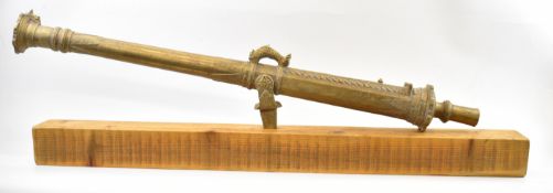 Malaysian bronze lantanka gun or cannon with ornate cast decoration and 4ft barrel, raised on swivel
