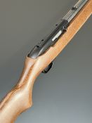 Ruger Model 10/22 .22 semi-automatic rifle with semi-pistol grip, adjustable sights, sound moderator