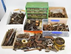 A very large collection of mainly antique gun parts including flintlock, percussion and pinfire