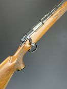 Remington 700 .243 Winchester bolt-action rifle with chequered semi-pistol grip and forend, raised