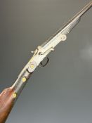 Belgian .410 hammer action folding poacher's shotgun with engraved action, chequered grip and forend