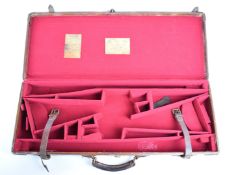 James Purdey & Sons leather bound double shotgun carry case with fitted interior and 'James Purdey &