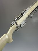 Howa Model 1500 .223 Remington bolt-action rifle with composite stock, textured semi-pistol grip and