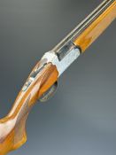 Rota 20 bore over and under ejector shotgun with engraved scenes of birds and dogs to the action and