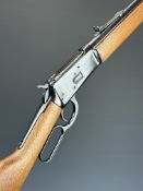 Rossi .38/ .357 underlever-action repeating carbine rifle with adjustable sights, wooden stock and