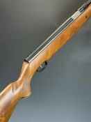 Weihrauch HW77 K .22 underlever air rifle with chequered semi-pistol grip, raised cheek piece and
