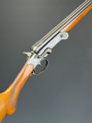 Cebra .410 side by side hammer action folding poacher's shotgun with chequered semi-pistol grip