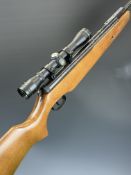 SMK Model XS208 .22 air rifle with semi-pistol grip, adjustable trigger and 4x32 scope, NVSN. PLEASE