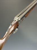 Gunmark Harrier 12 bore side by side shotgun with named underside, chequered grip and forend, double