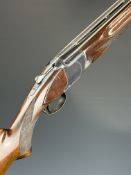Browning B125 12 bore over and under ejector shotgun with border engraved locks, underside,