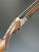 Miroku 12 bore over and under ejector shotgun with engraved locks, underside, trigger guard and
