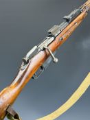 Deactivated Russian Mosin Nagant 7.62 bolt-action rifle with adjustable sights, canvas sling, sniper