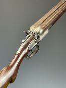 Petersen & Son of London 12 bore side by side hammer action shotgun with engraved locks, hammers,