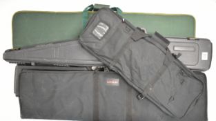 Five shotgun or rifle carry cases including two hard examples, Webley & Scott, Logun, Gun Guard etc