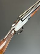 CZ 12 bore side by side sidelock shotgun with chequered grip and forend, sling mounts, double