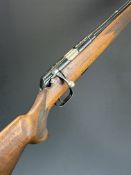 Mauser .22 bolt-action rifle with chequered semi-pistol grip, multi-shot magazine, sling mounts