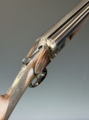 Belgian 8 bore double barrelled side by side shotgun with chequered grip and forend, carved horn