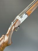 Beretta Model S687 Sporting 12 bore over and under ejector shotgun with engraved scenes of birds
