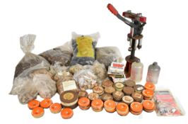 A collection of shotgun or rifle cartridge re-loading equipment including MEC press, primers,
