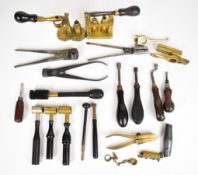 Twenty-one gun and gunsmith tools including bullet moulds, chamber brush, James Dixon & Sons and