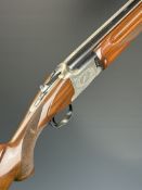 Winchester 101 XTR Lightweight 12 bore over and under ejector shotgun with engraved scenes of