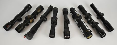 Eight various rifle or pistol scopes including Nikko Stirling 3x20 and 2.5x32, SMK, Burris, Thompson