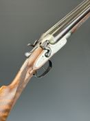 T Stensby & Co of Manchester 12 bore side by side hammer action shotgun with engraved locks,