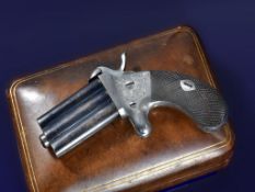 Unnamed pin-fire double barrelled over and under pocket pistol with engraved frame, chequered grips,