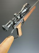 Browning Buckmark .22 semi-automatic rifle with monogrammed wooden pistol grip, two multi-shot