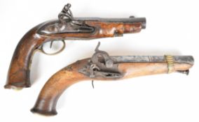 Two coat pistols one percussion hammer action with Roman style lock, belt hook, brass butt plate and