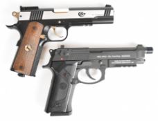 Two .177  CO2 air pistols Colt Special Combat with chequered wooden grips and adjustable sights