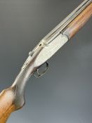 Rizzini 12 bore over and under ejector shotgun with engraved sidelock plates, underside, trigger