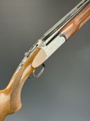 Silhouette 200 12 bore over and under ejector shotgun with ornately engraved action, underside,