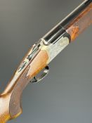 Lanber 12 bore over and under ejector shotgun with engraved scenes of birds to the locks and