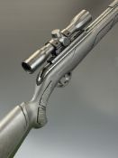 Gamo Varmint Stalker Deluxe .22 air rifle with textured semi-pistol grip, raised cheek piece,