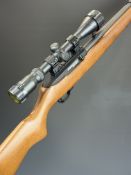 Ruger Model 10/22 .22 semi-automatic rifle with semi-pistol grip, multi-shot magazine, sling mounts,