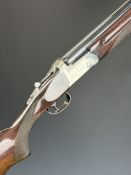 AYA Yeoman 12 bore over and under ejector shotgun with named locks and underside, chequered semi-
