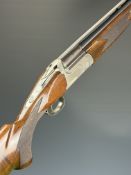 Classic Sporting 12 bore over under ejector shotgun with named and engraved action, engraved trigger
