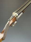 Thomas Wild 12 bore side by side ejector shotgun with named and engraved locks, engraved