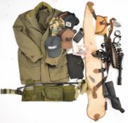 A collection of gun and shooting related items including Maginon spotting scope, Artemis 2000 3-