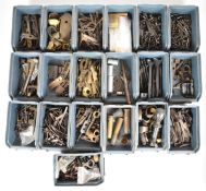 A very large collection of antique gun parts including rifle ladder sights, triggers, springs,