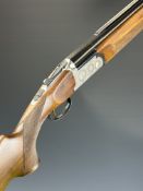 Rizzini 12 bore over and under ejector shotgun with engraved locks, underside, trigger guard, top