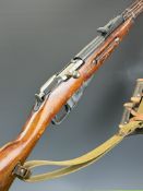 Deactivated Russian Mosin Nagant 7.62 bolt-action rifle with adjustable sights, canvas sling with