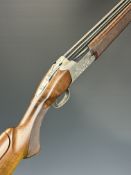 Browning B725 Hunter G1 12 bore over and under ejector shotgun with engraved scenes of birds to