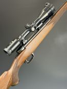 Heym 7x57 left-handed bolt-action rifle with chequered semi-pistol grip and forend, raised cheek