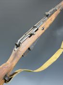 Deactivated Russian Mosin Nagant 7.62 bolt-action rifle with adjustable sights, canvas sling, top