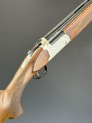 Kofs Sceptre SxE 12 bore over and under ejector shotgun with engraved action and underside,