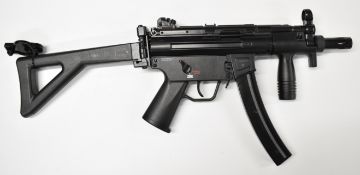 Heckler & Koch MP5K .177 assault style airsoft rifle with folding tactical stock, adjustable sights,